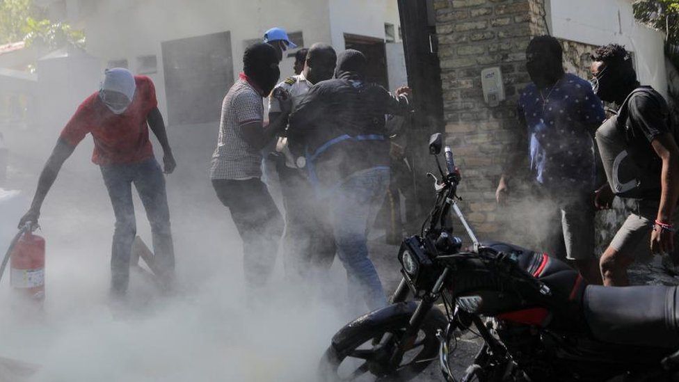 Haiti police riot after crime gangs kill 14 officers