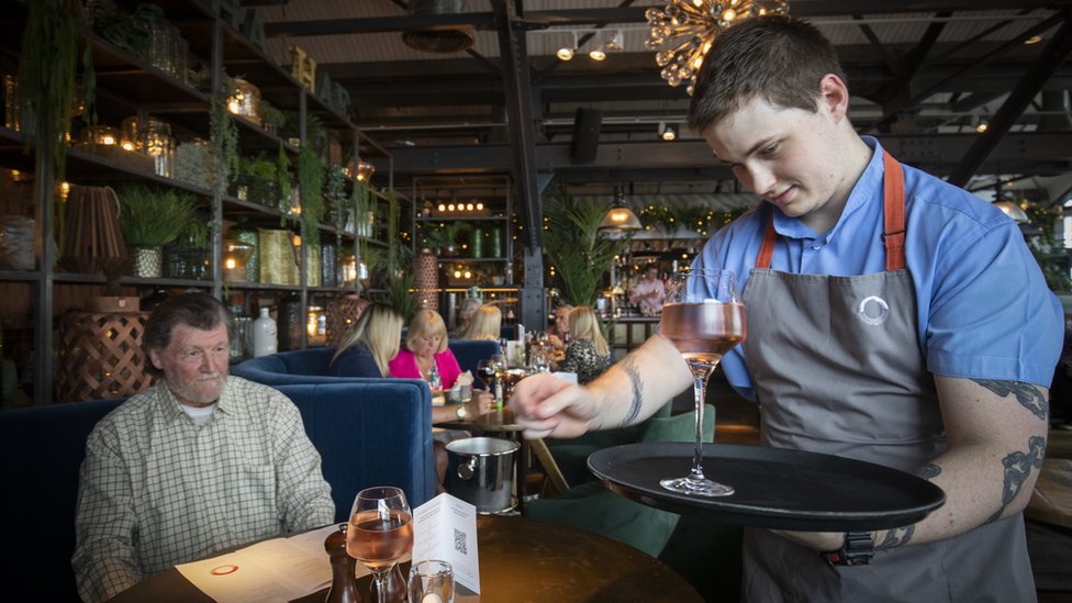 Barman serves drinks at Scotts in South Queensferry as pubs, bars and restaurants across Scotland opened indoor areas