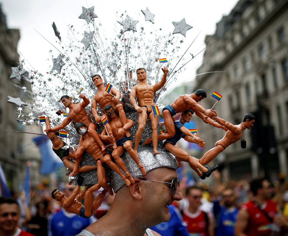 A participant attends the annual Pride in London parade