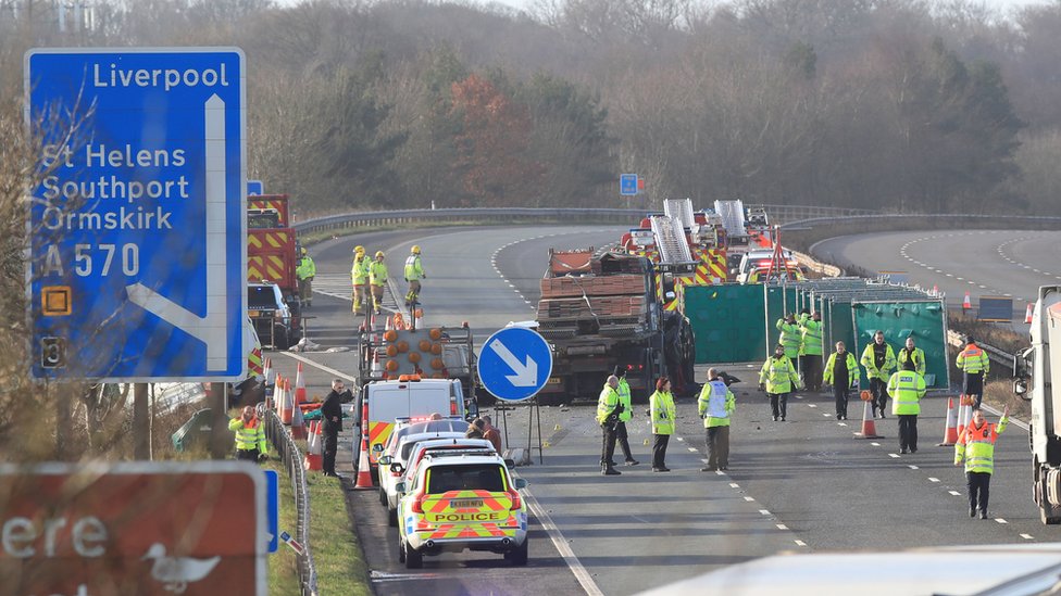 Boy 14 and woman die in M58 crash