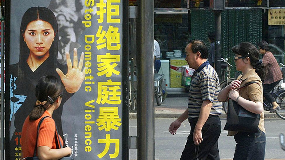 Poster anti kekerasan rumah tangga di China.