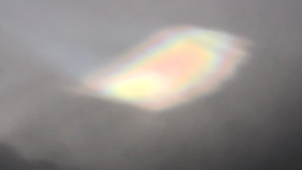 Iridescent colours in cloud