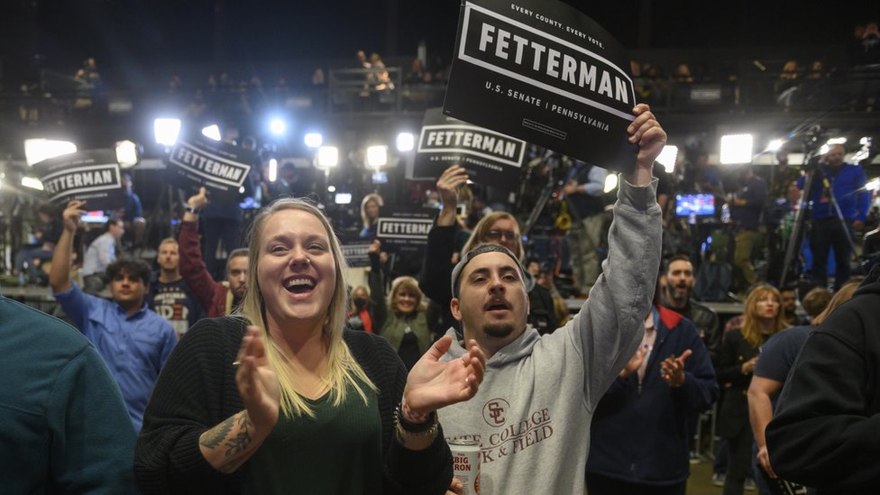 Supporters of Democratic Senate candidate John Fetterman cheer early voting results at StageAE on election night 8 November 2022 in Pittsburgh, Pennsylvania.