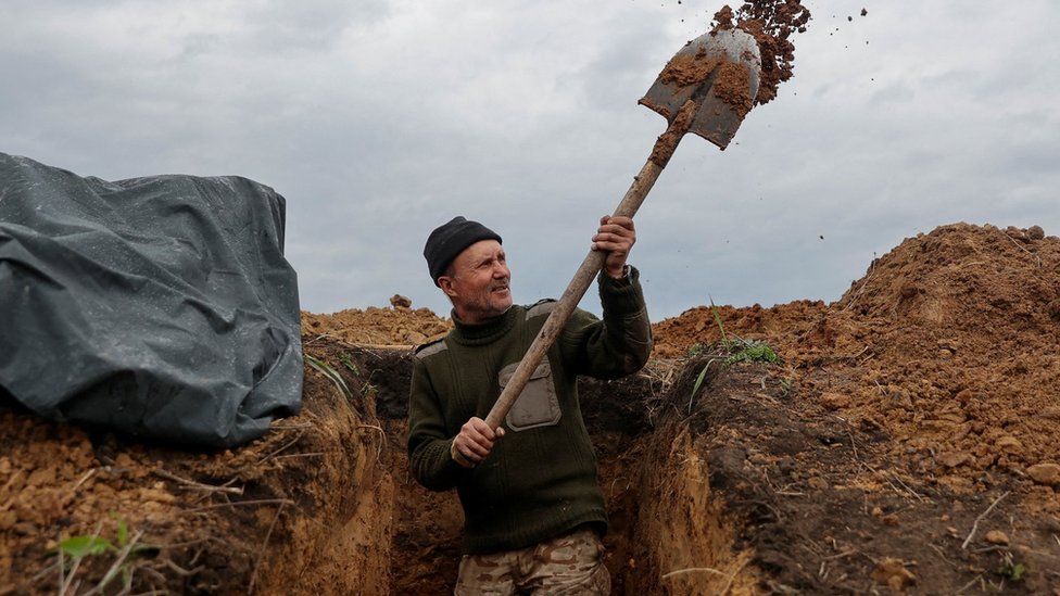Ukrainian preparing a trench in the Donetsk region,
