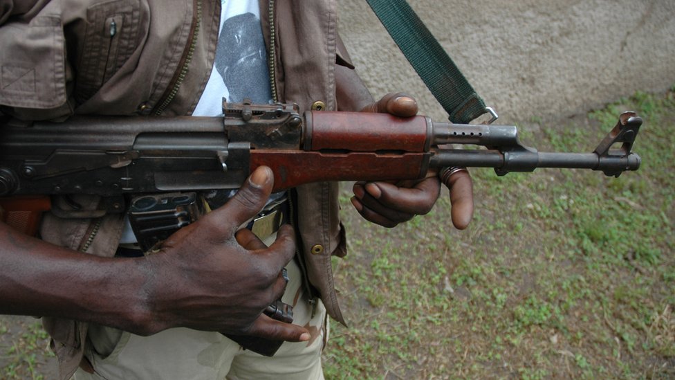 A man holds an AK-47 rifle (file image)