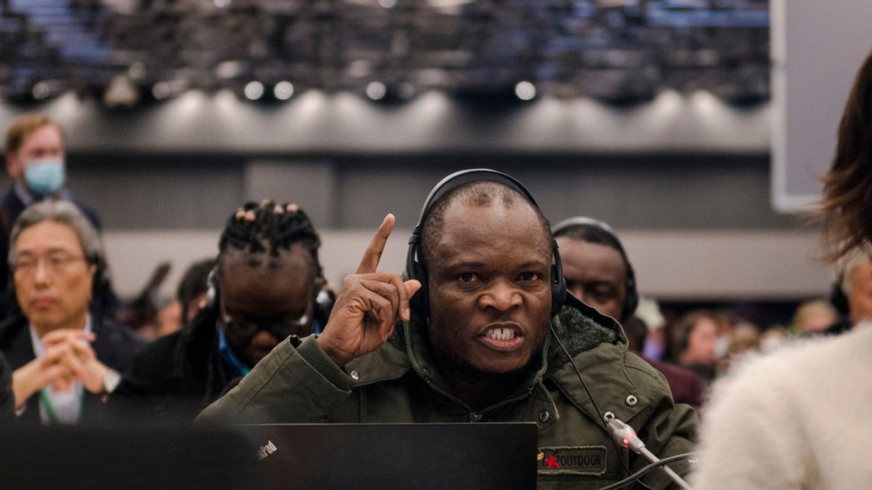 The delegate for the Democratic Republic of Congo gestures after being told it was not a formal rejection of the proposed agreements during the plenary for the tail end of the United Nations Biodiversity Conference