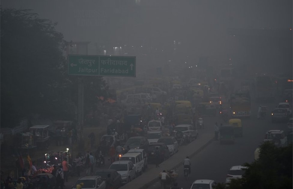 Traffic is seen through heavy smog in New Delhi on November 8, 2017.