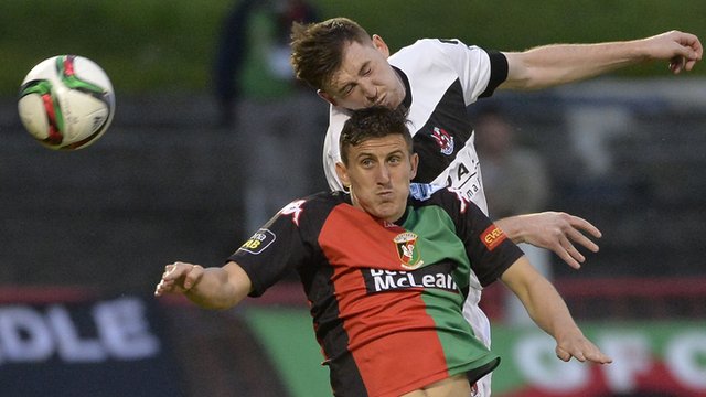Action from Glentoran against Crusaders at The Oval