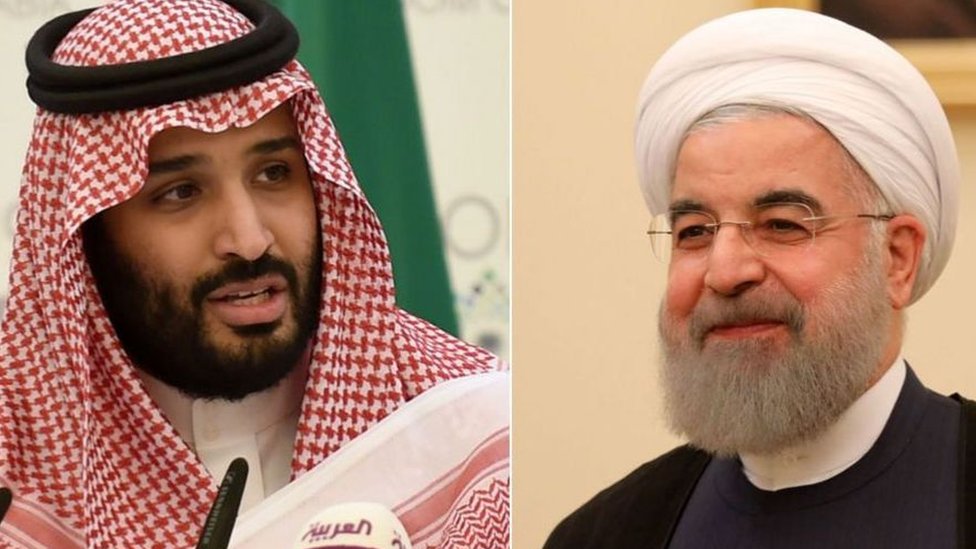ولي العهد السعودي الأمير محمد بن سلمان (يسار) والرئيس الإيراني حسن روحاني