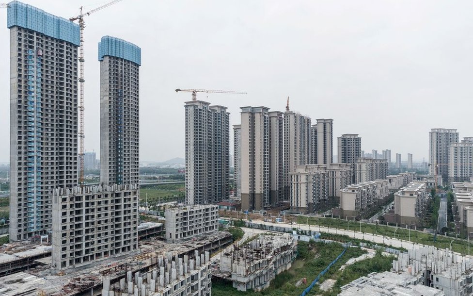 A housing complex under construction by Chinese property developer Evergrande is seen in Wuhan, in China's central Hubei province on September 28, 2023.