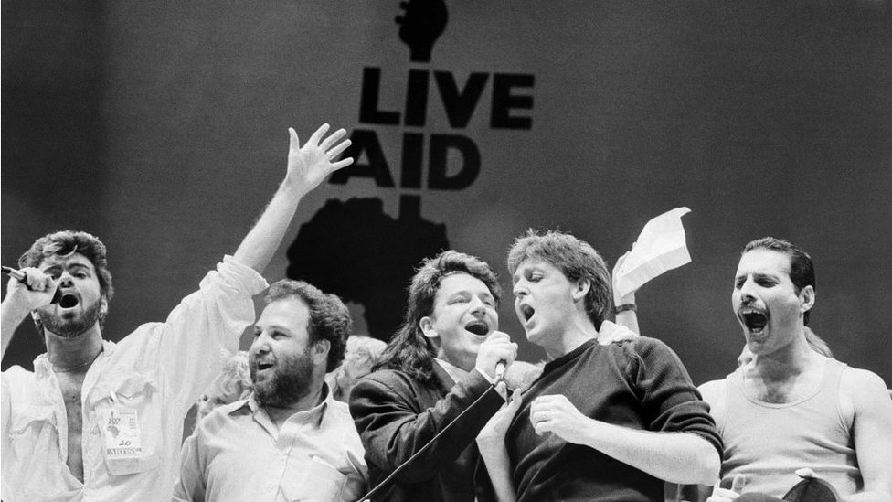 George Michael, U2, Paul McCartney and Queen perform at the Live Aid concert in 1985