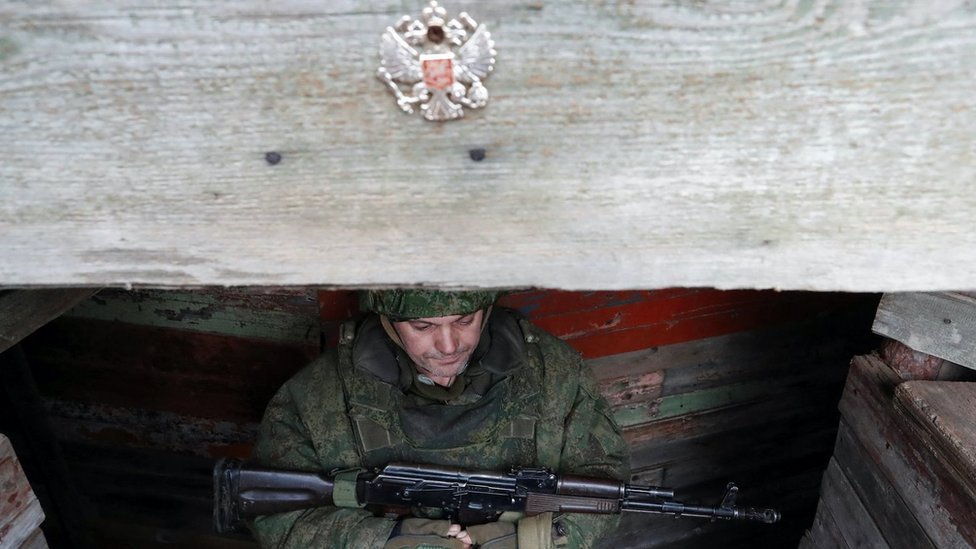 Pro-Russian rebels guard combat positions near separation line in Luhansk region, 17 February 2020