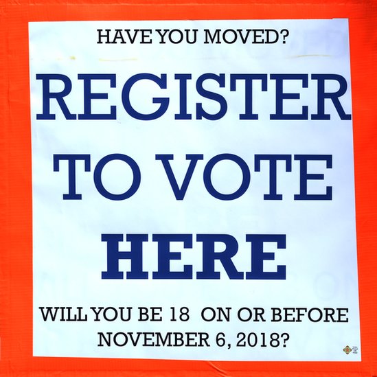 Cartel que promueve el registro para votar en Estados Unidos