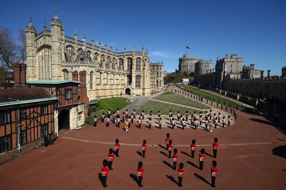 Members of the military stands outside St George's Chapel before the funeral service of Britain's Prince Philip, Duke of Edinburgh in Windsor Castle