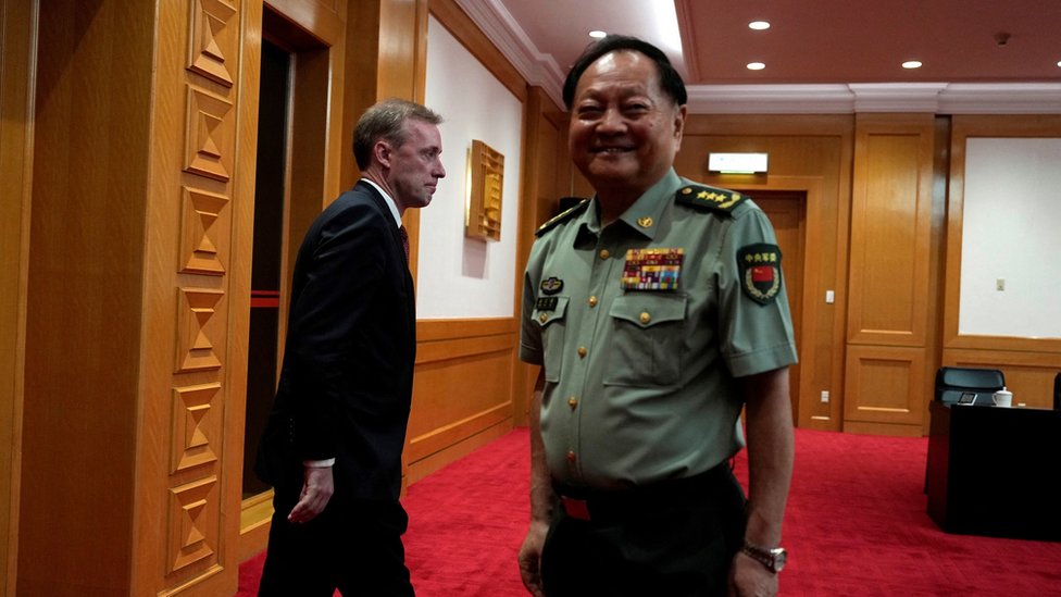 White House national security adviser Jake Sullivan, walks past Zhang Youxia, Vice Chairman of the CPC Central Military Commission at right before a meeting at the Bayi building in Beijing, Thursday, Aug. 29, 2024