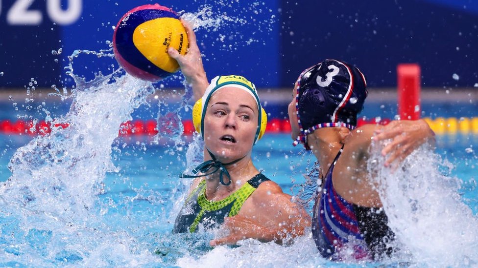 Two water polo players, Keesja Gofers of Team Australia and Ekaterina Prokofyeva of Team ROC competing at the Tokyo 2020 Olympic Games