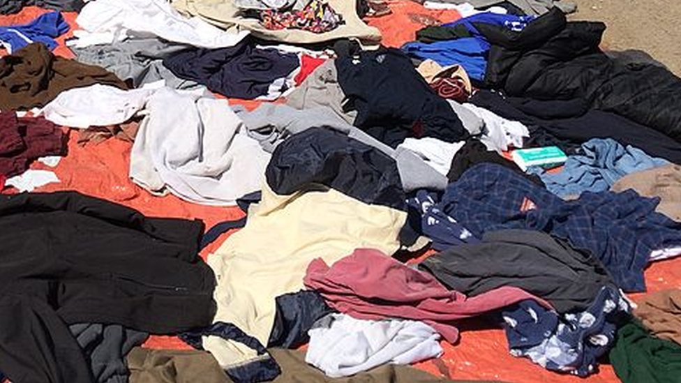 The fast-fashion waste mountain: Gigantic pile of clothes looms