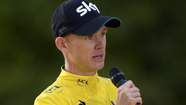 Chris Froome makes a speech after winning the Tour de France