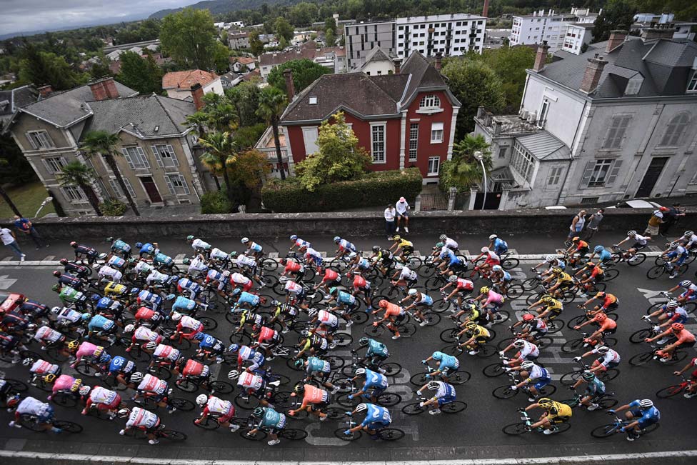 An elevated view of a large number of cyclists taking part in the Tour de France