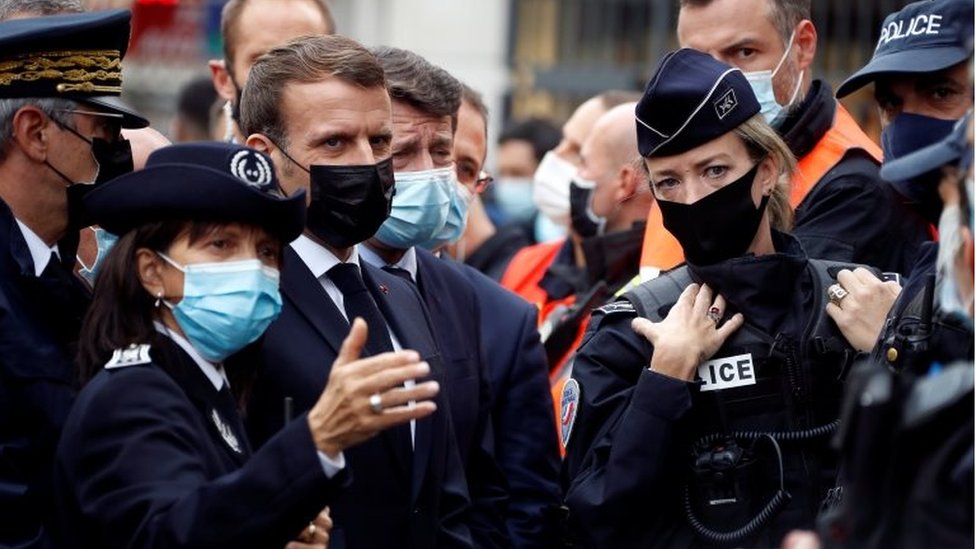 French President Emmanuel Macron (3rd left) meeting police officers in Nice. Photo: 29 October 2020