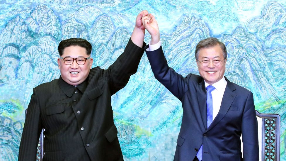 Kim y Moon Jae-in.