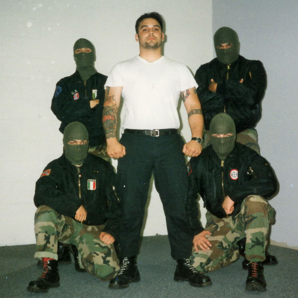 Picciolini posing with other Nazi skinheads