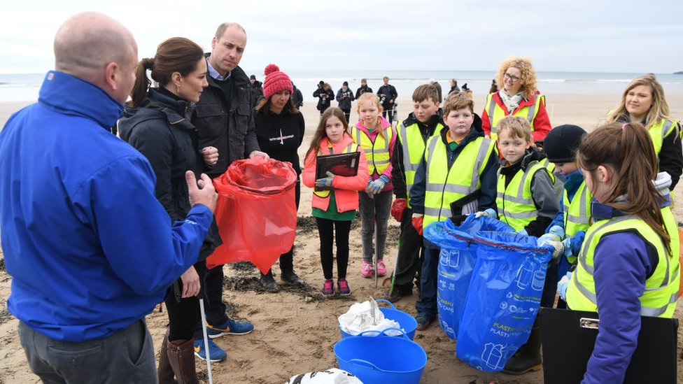 Prince William and Catherine join primary school pupils in a beach clean-up on Newborough Beach, during a visit to Anglesey on 8 May 2019