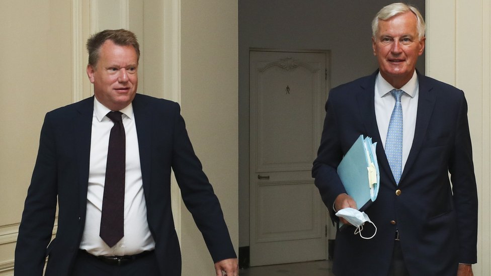 Lord Frost, the UK's chief Brexit negotiator, and his EU counterpart Michel Barnier, arrive for a meeting, in Brussels in August