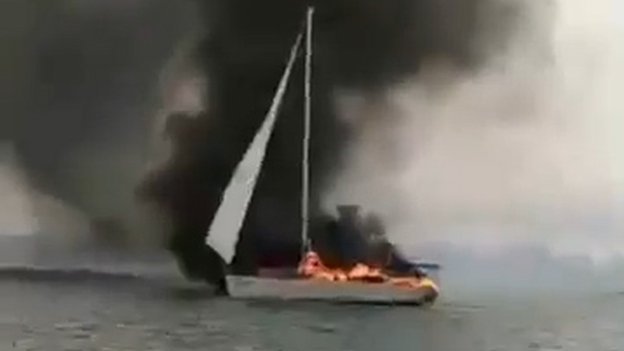 Nine Britons rescued from burning yacht off Thai coast - BBC News