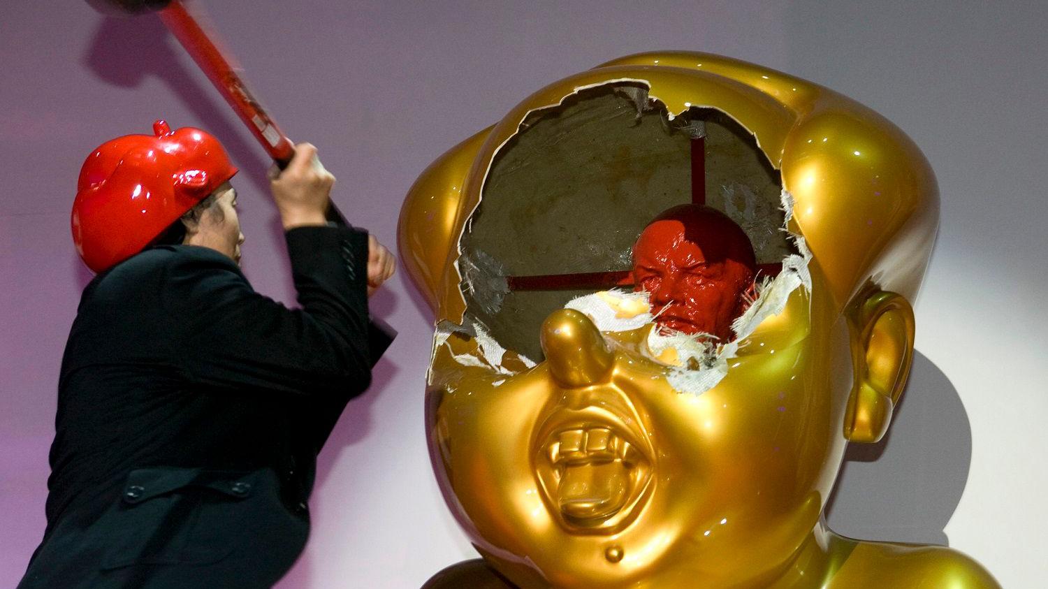 Gao Zhen: Chinese artist detained for 'insulting' Mao sculptures