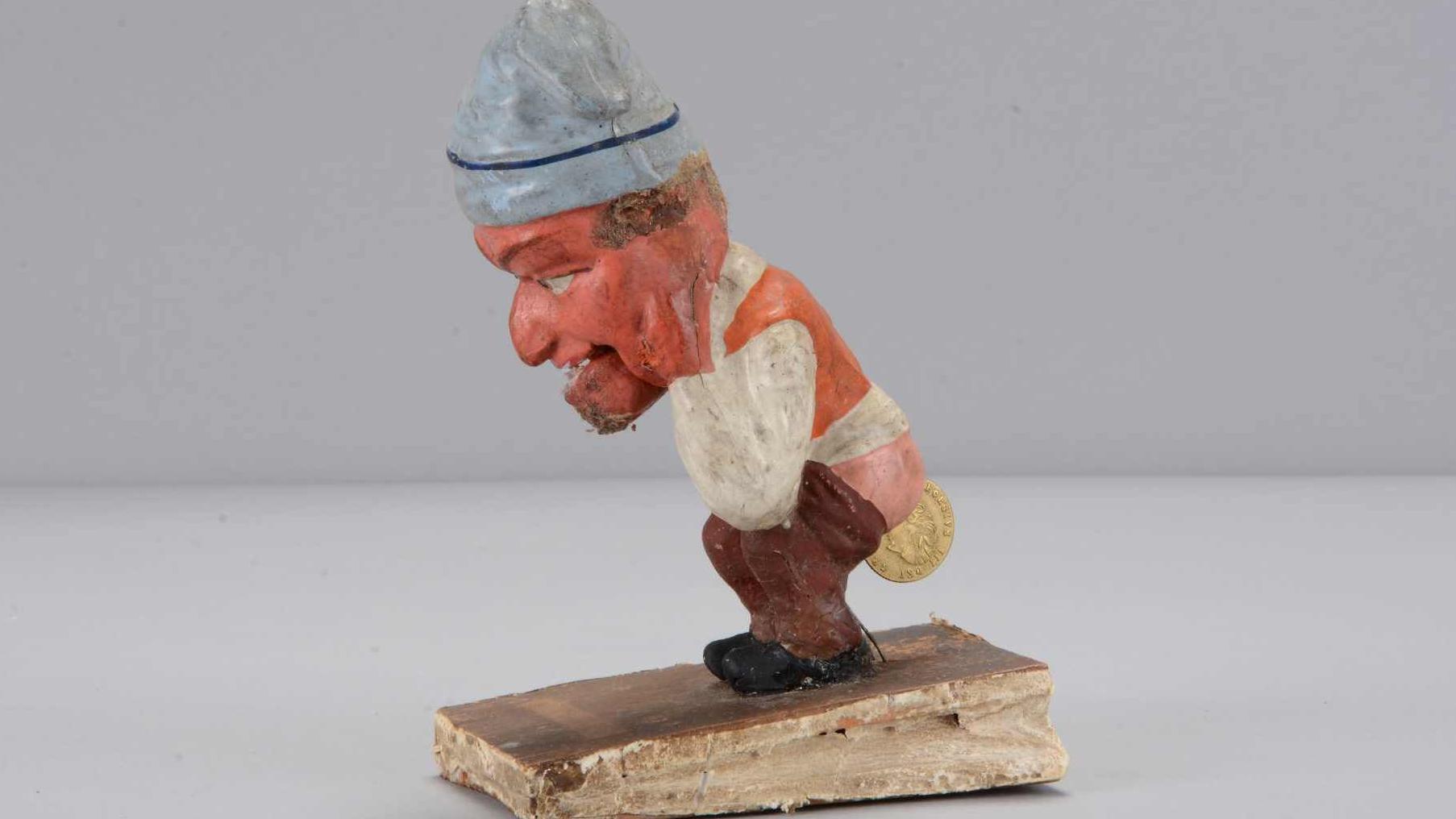 Disturbing' 19th Century German toys fetch £192k at auction