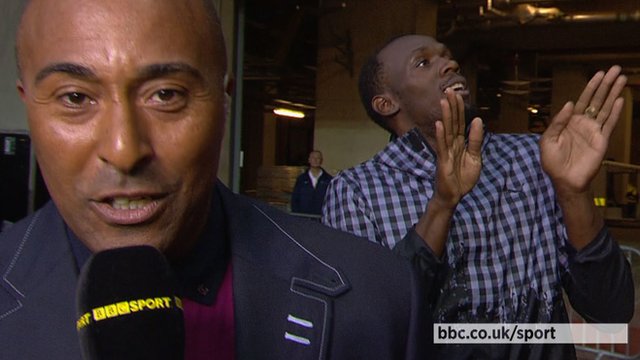 Usain Bolt busts some moves behind Colin Jackson