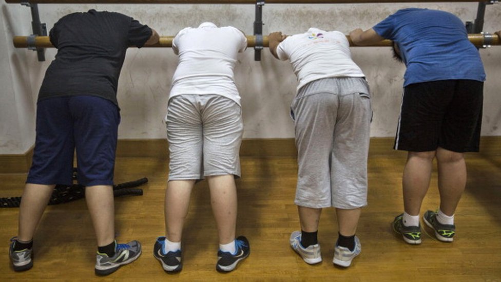 Китайские студенты с избыточным весом на тренировочных сборах в Пекине, июль 2014 г.