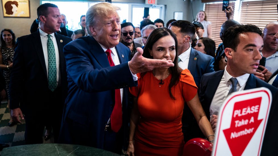 Donald Trump and supporters at Cafe Versailles in Miami