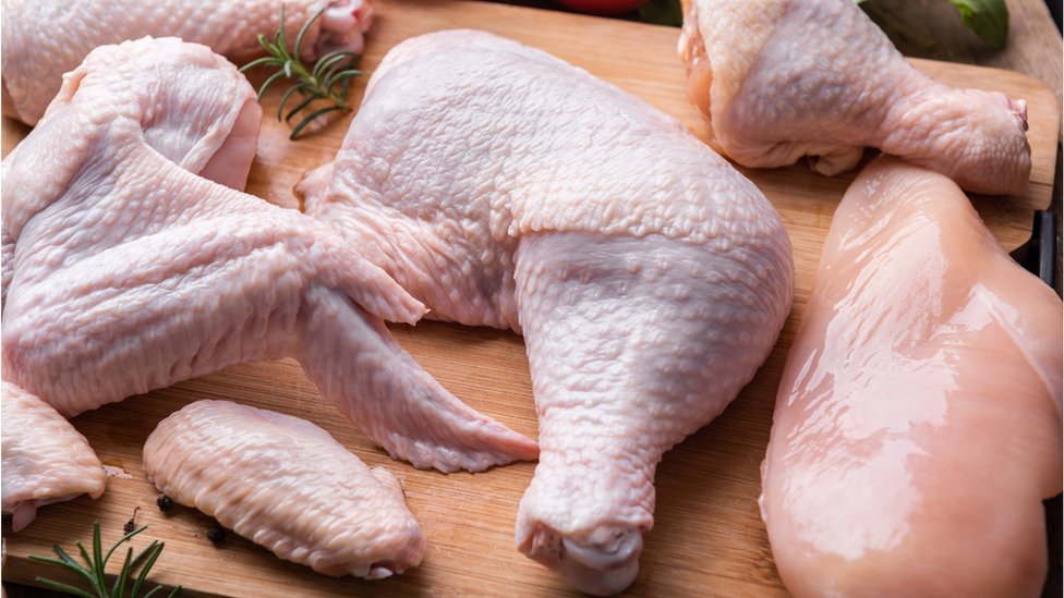 Chicken on a chopping board