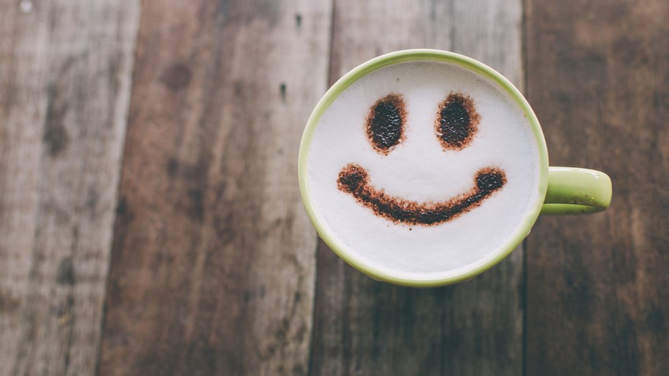 No siempre las sonrisas estuvieron de moda Sonrisa dibujada en un café