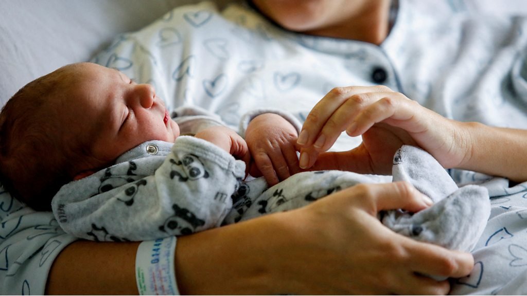 Watch: The babies born as world population hits 8bn