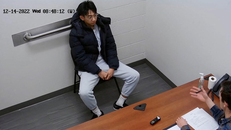 Xiaolei Wu, a citizen of China who at the time was a student at the Berklee College of Music in Boston, sits for an interview with the Federal Bureau of Investigation at its office in Chelsea, Massachusetts, December 14, 2022 in a still image from video. U.S. Attorney』s Office for the District of Massachusetts/Handout via REUTERS.