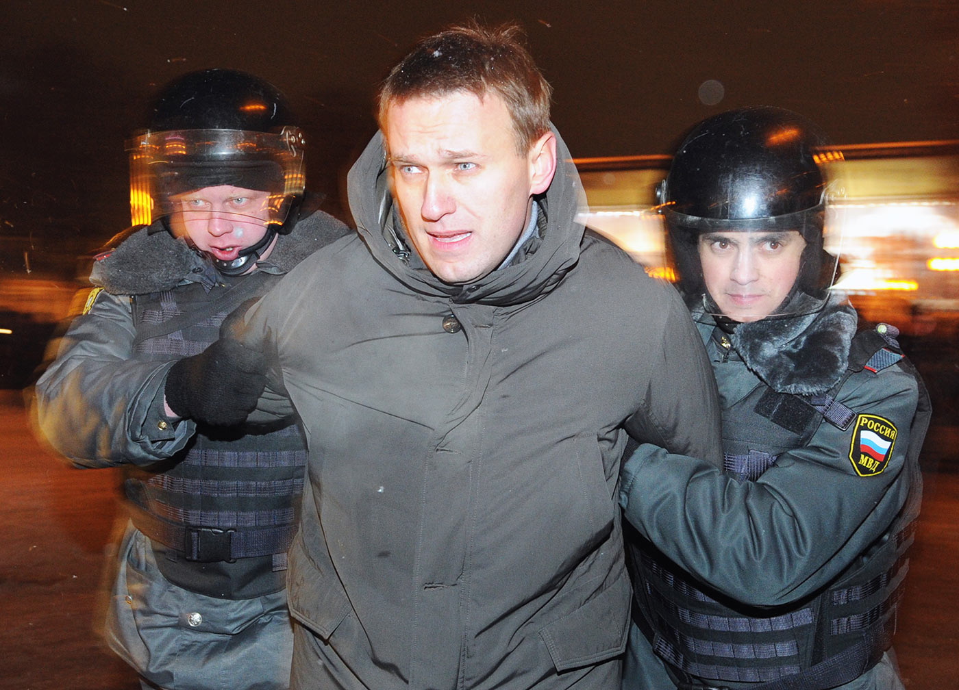 Police officers detain Alexei Navalny at Moscow's Pushkinskaya Square - 5 March 2012