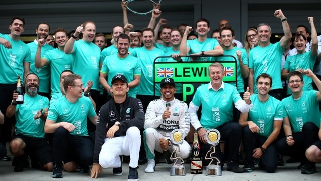 The Mercedes team celebrate Lewis Hamilton's win in Russia