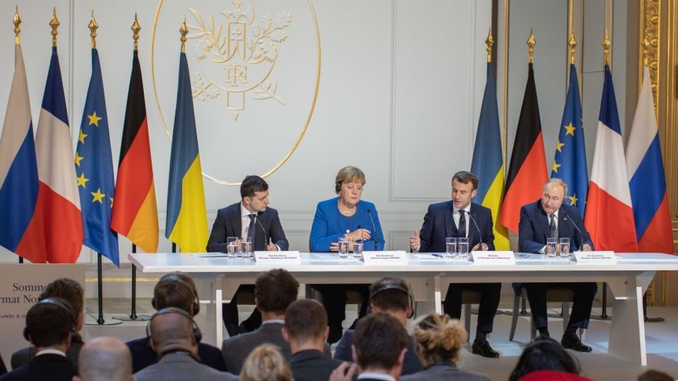 Ukraine's President Volodymyr Zelensky (L), Germany's Chancellor Angela Merkel (2nd L), France's President Emmanuel Macron (2nd R), and Russia's President Vladimir Putin (R) attend a news conference after a Normandy Four summit at the Elysee Palace in Paris, France on 10 December 2019