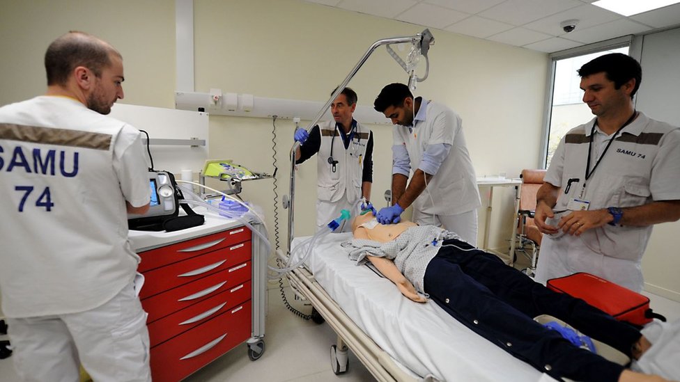 Emergency doctors take part in the presentation of a new synchronized ventilation device in France