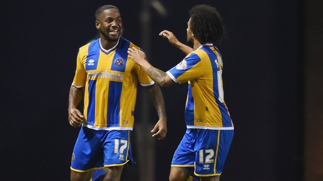 Shrewsbury Town's Abu Ogogo celebrates