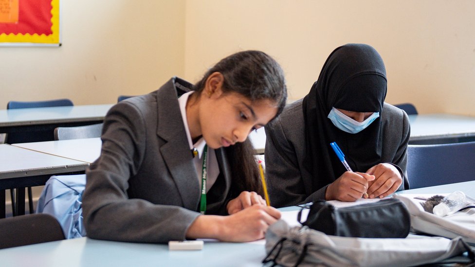 Pupils from years 7 and 11 return to Manor High School in Oadby, Leicestershire, in August 2020