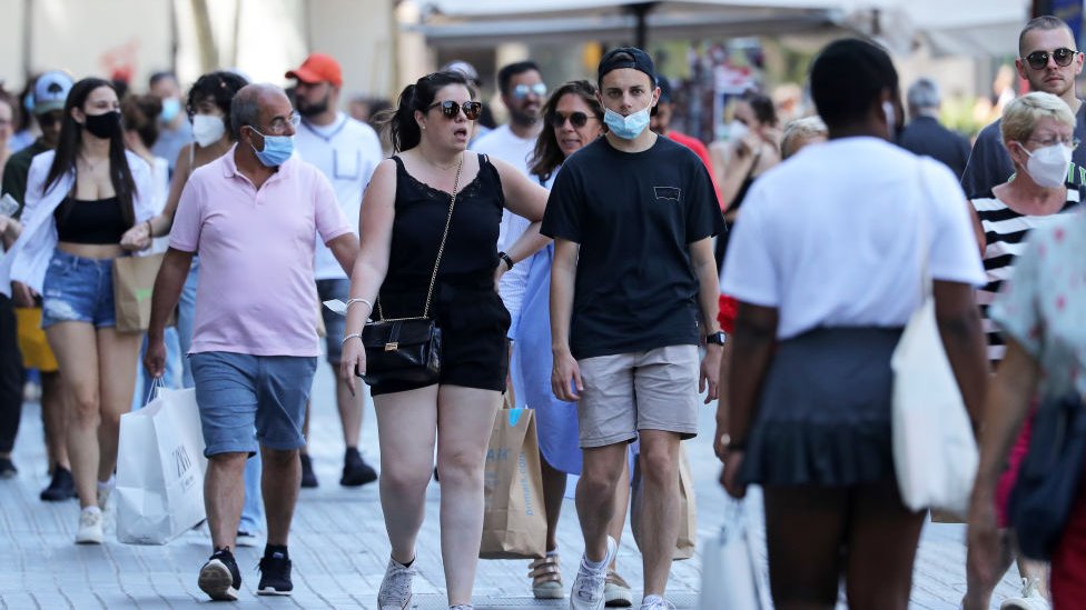 Tourists walking in Barcelona.