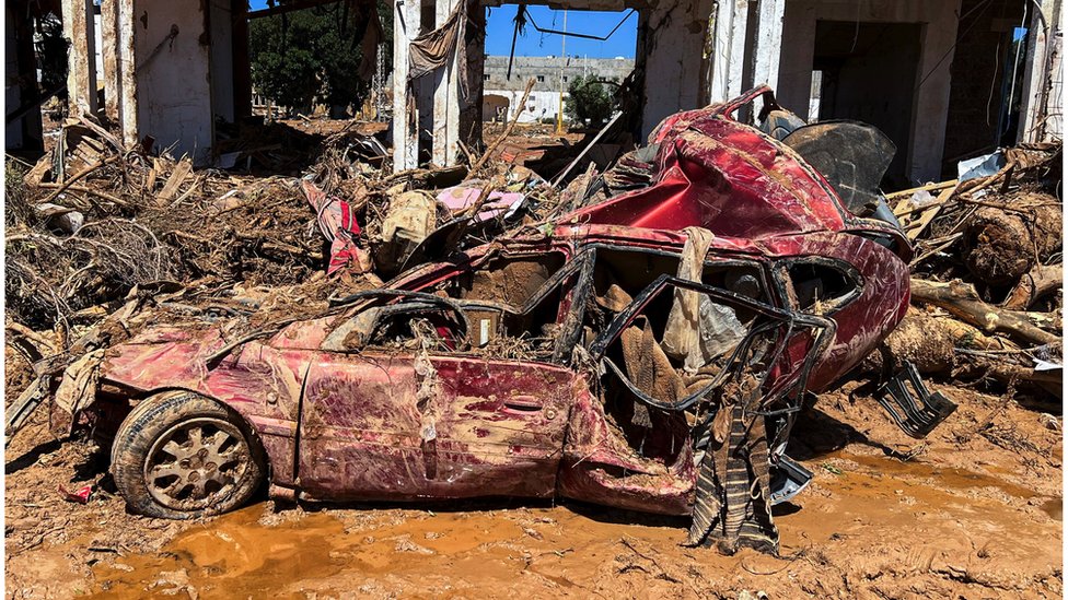 A damaged car following a powerful storm and heavy rainfall hitting the country in Derna, Libya on 13 September, 2023.