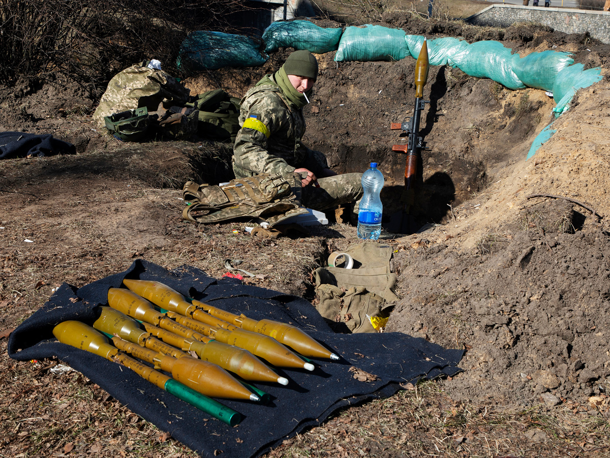 A Ukrainian soldier with rocket launchers in a trench in Kyiv, 28 February 2022