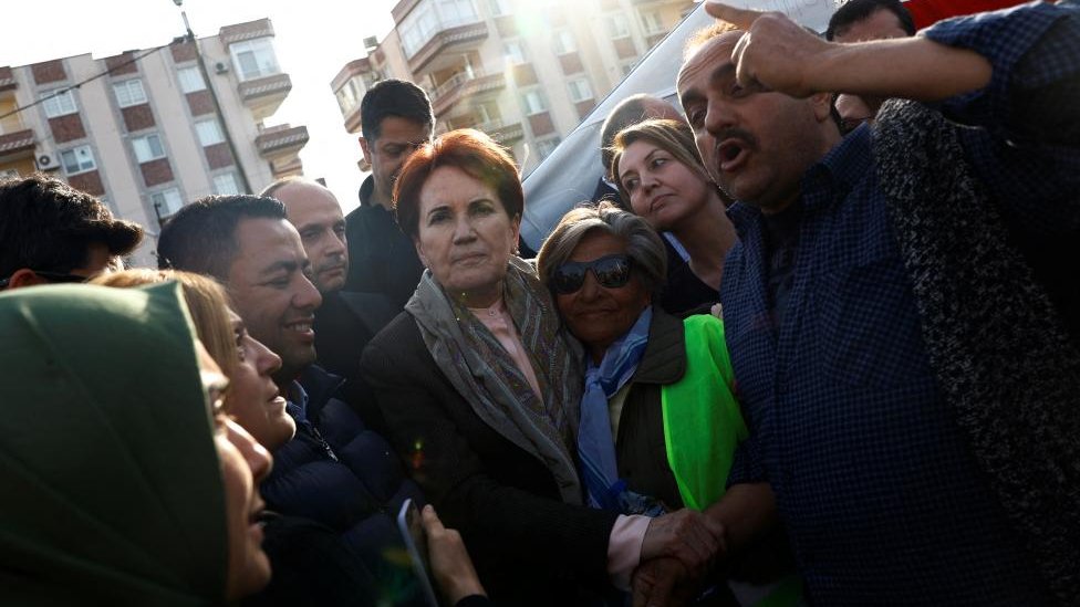 Meral Aksener, leader of IYI (Good) Party, visits earthquake survivors living in tents in the aftermath of a deadly earthquake, on the outskirts of Iskenderun, Turkey, March 11, 2023