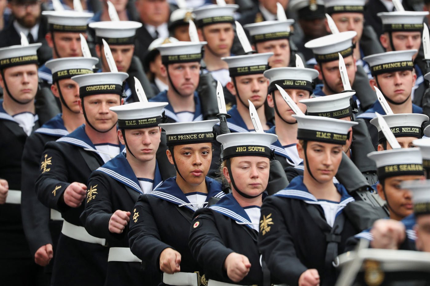The Royal Navy contingent march toward their positions before the coronation ceremony