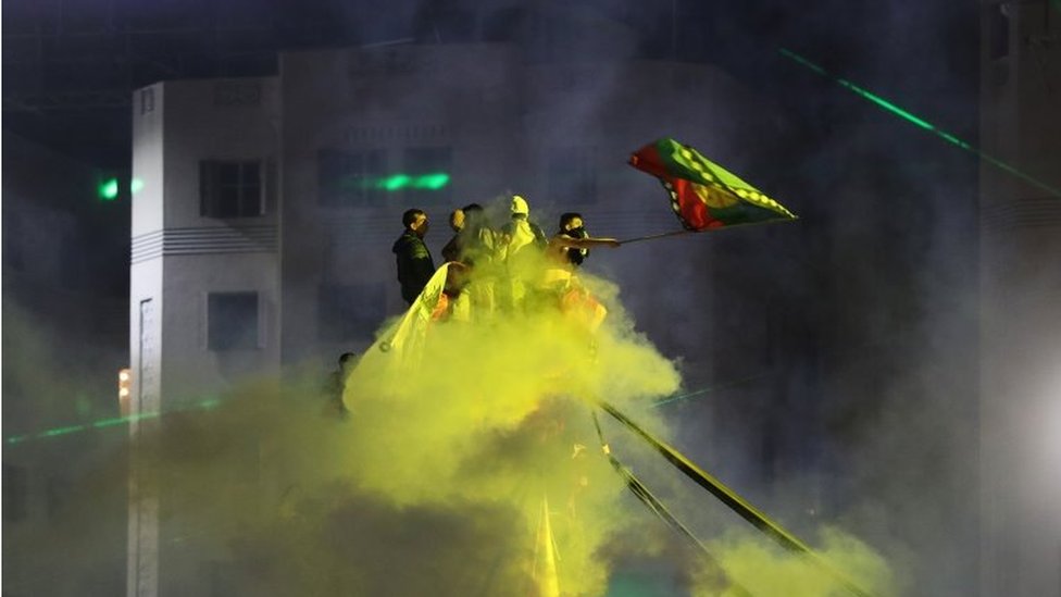 People react to the results of a referendum on a new Chilean constitution in Santiago, Chile, October 25, 2020